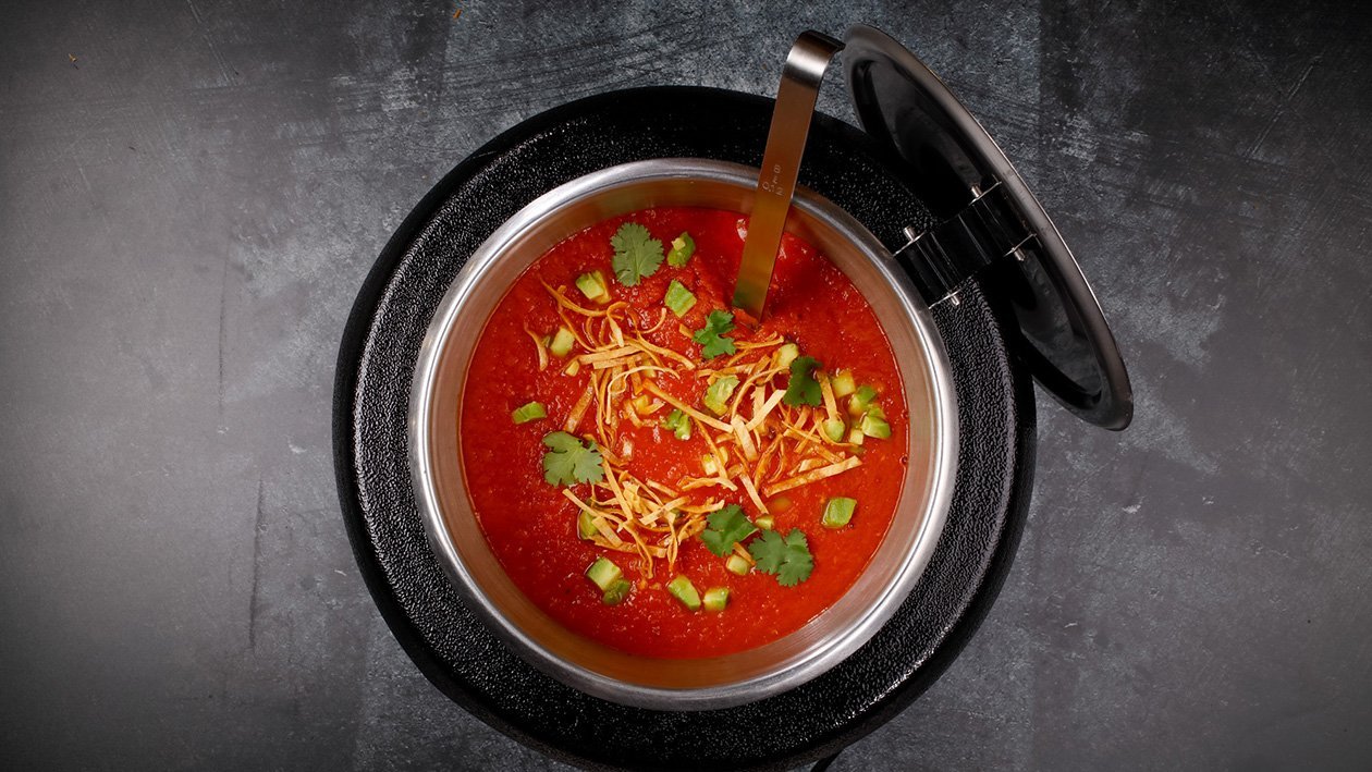 Aztécká polévka s tortilla čipsy, čedarem a zakysaným krémem Aztécká polévka s tortilla čipsy, čedarem a zakysaným krémem