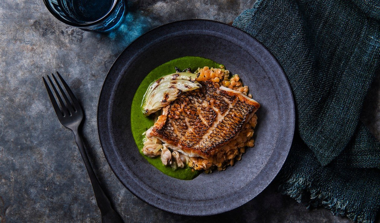 Black Sea Bass with Charred Fennel, Red Lentils, and Citrus Ocean Broth