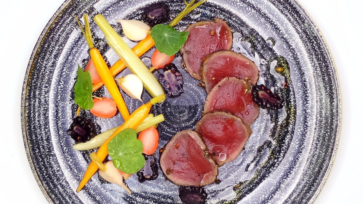 Cured venison with pickled garden vegetables, blackberries and nasturtium leaves Cured venison with pickled garden vegetables, blackberries and nasturtium leaves