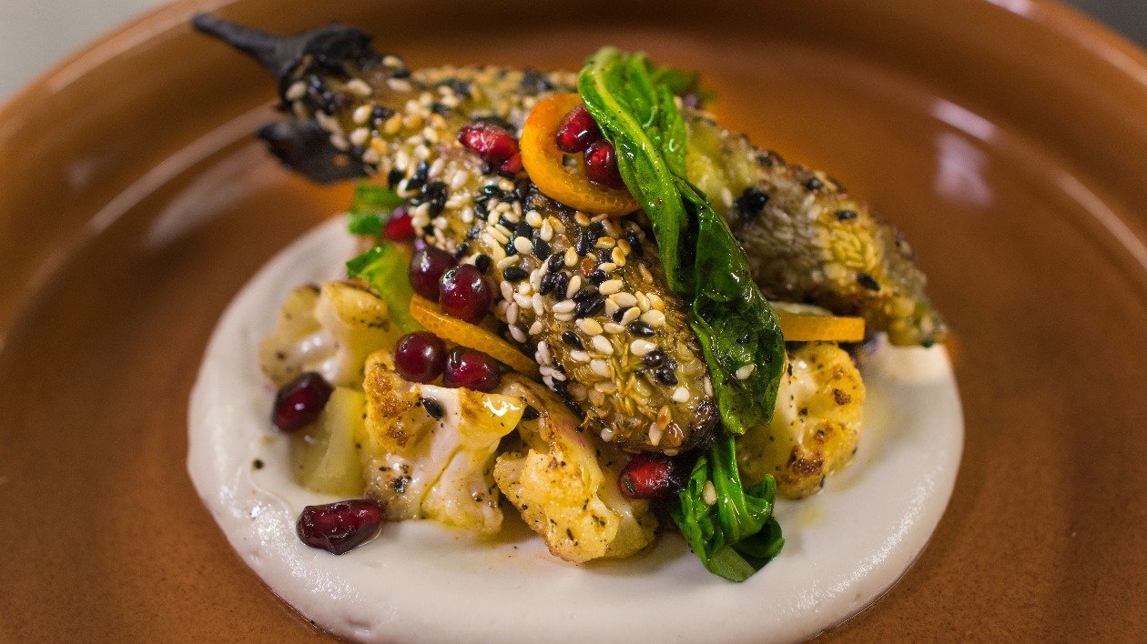 Sesame crusted aubergine, cauliflower puree, sautéed pak choi and kumquat Sesame crusted aubergine, cauliflower puree, sautéed pak choi and kumquat