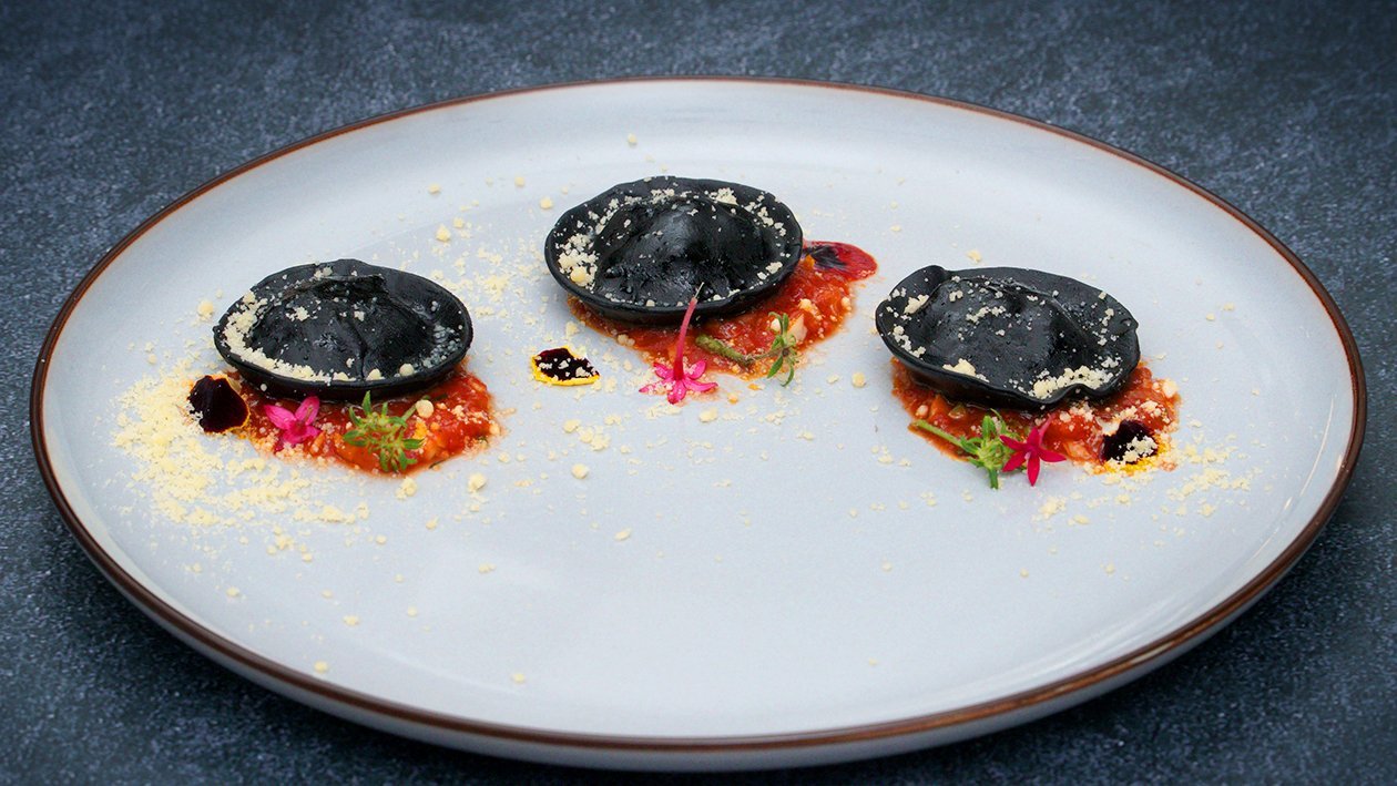 Black Squid Ink Ravioli with Szechuan Grilled Chicken Filling Black Squid Ink Ravioli with Szechuan Grilled Chicken Filling