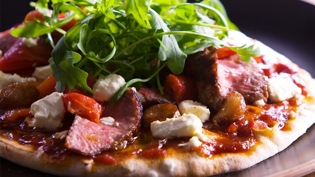 BBQ Prime Rib Pizza with Roasted Garlic, Roasted Peppers, Red Onions, Soft Fetta and Wild Rocket – Recipe BBQ Prime Rib Pizza with Roasted Garlic, Roasted Peppers, Red Onions, Soft Fetta and Wild Rocket – Recipe