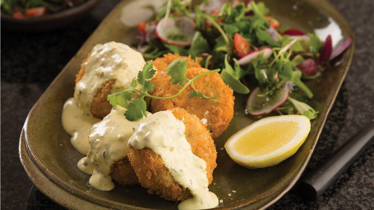 Trout Fishcakes Served With Jalapeño & Coriander Hollandaise Sauce