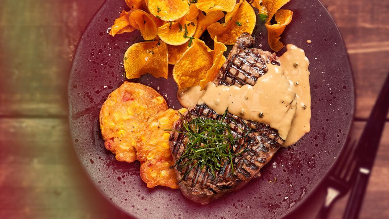 saucy corn: grilled steak with a corn and red pepper fritter