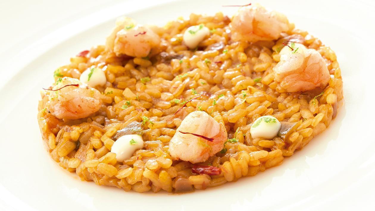 Arroz muy cremoso de langostinos, sofrito concentrado de tomate, azafran y alioli Arroz muy cremoso de langostinos, sofrito concentrado de tomate, azafran y alioli