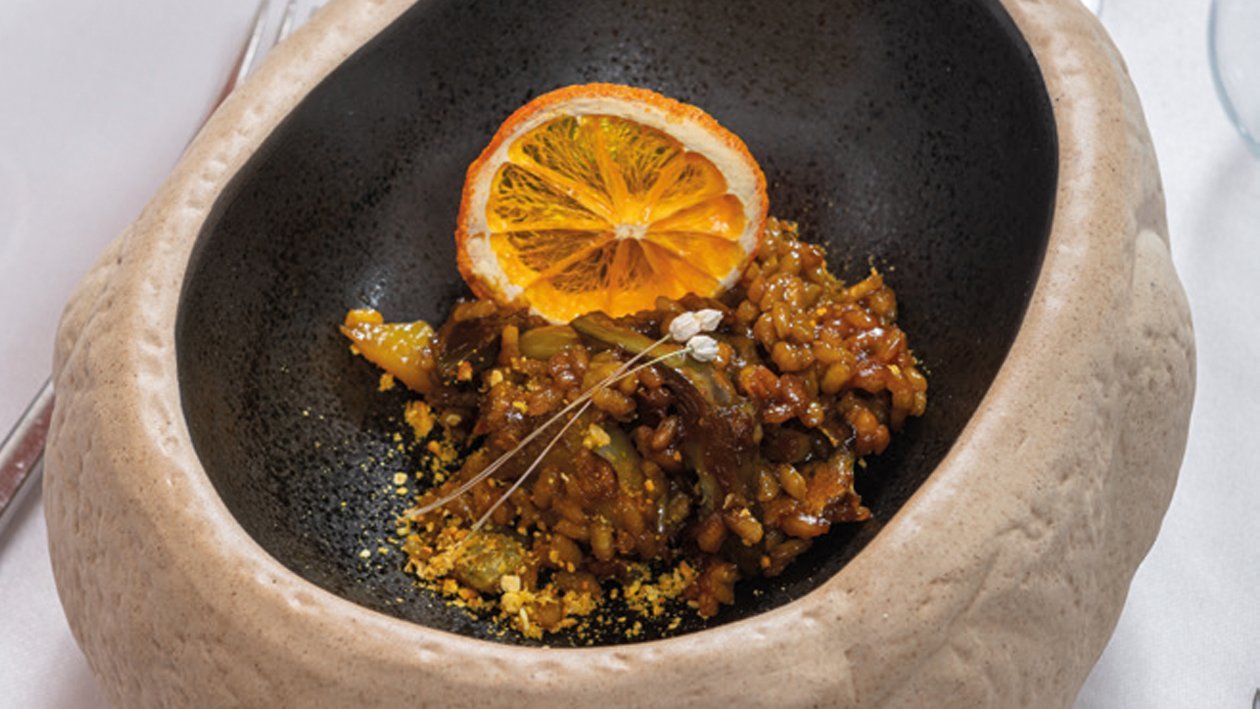 Arroz con alcachofas y boquerones de la vega baja Arroz con alcachofas y boquerones de la vega baja