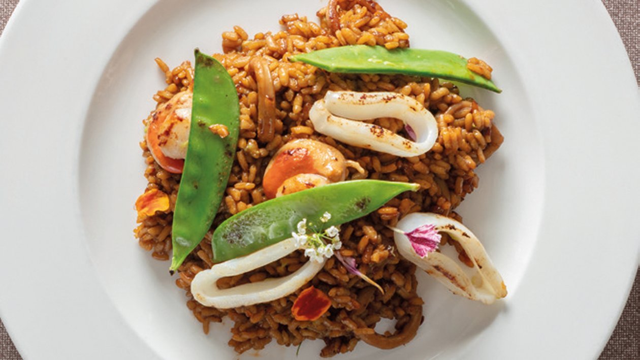 Arroz con zamburiñas, calamar y guisantes del Maresme Arroz con zamburiñas, calamar y guisantes del Maresme