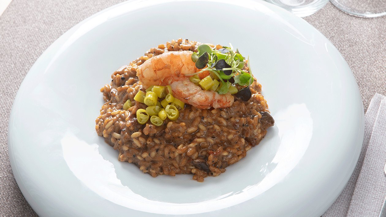 Arroz trufado con setas, gamba roja y piparra vasca Arroz trufado con setas, gamba roja y piparra vasca