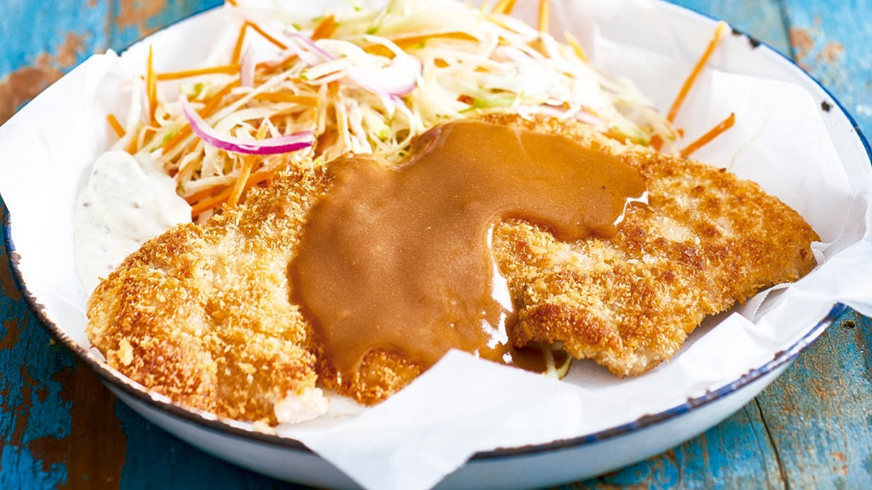 Crumbed pork schnitzel, mustard slaw, apple mustard gravy Crumbed pork schnitzel, mustard slaw, apple mustard gravy