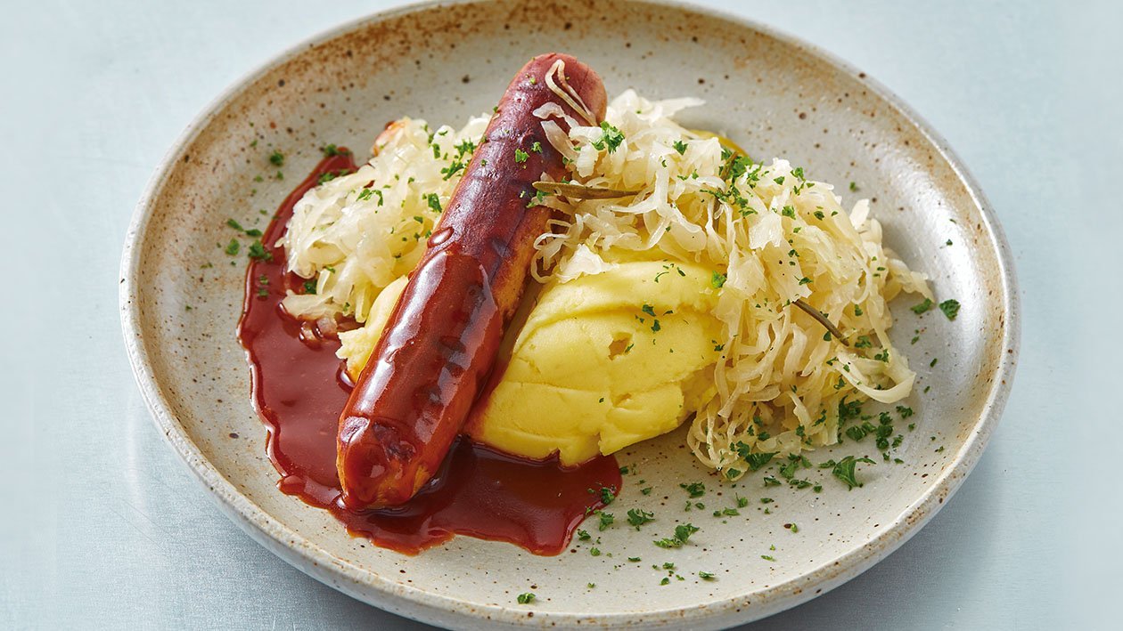 NoBratwurst con puré, salsa gravy y chucrut NoBratwurst con puré, salsa gravy y chucrut