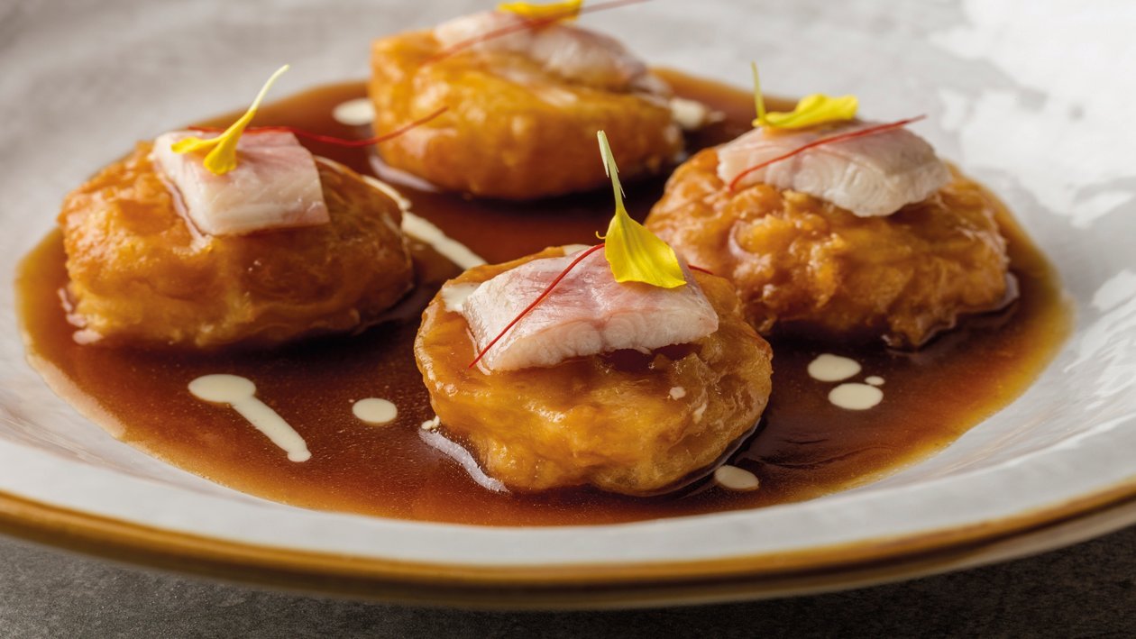 Patatas a la importancia con anguila ahumada Patatas a la importancia con anguila ahumada