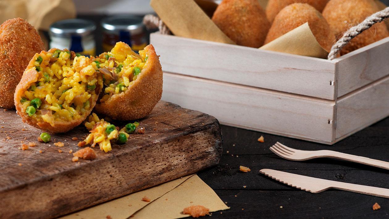 Arancino di riso alla curcuma con speck e piselli – Ricetta Arancino di riso alla curcuma con speck e piselli – Ricetta