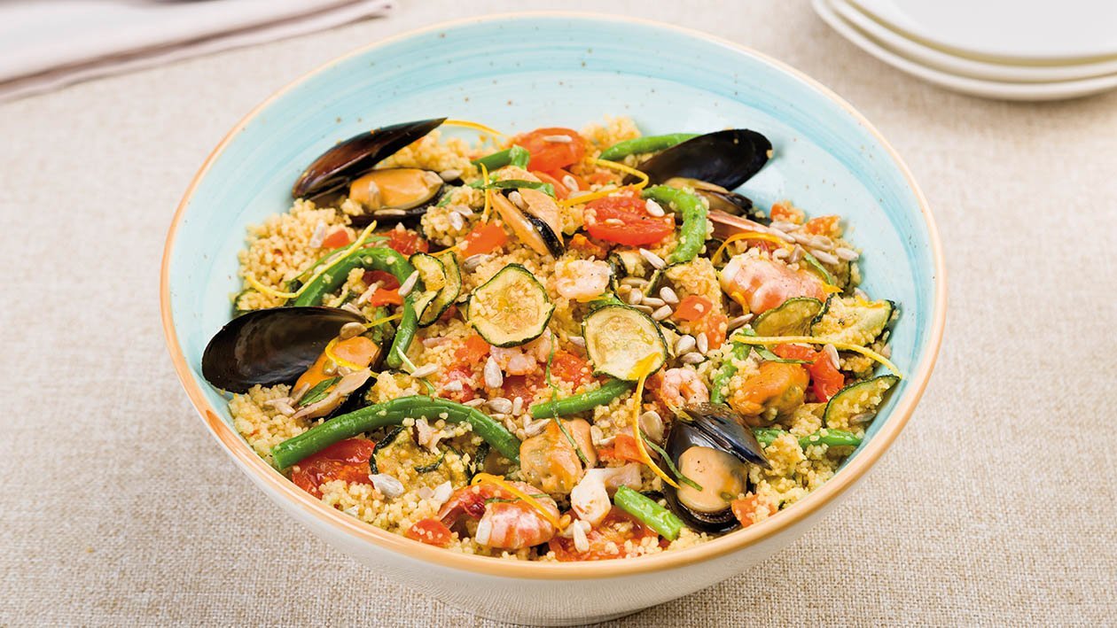 cous cous agrumato ai frutti di mare con fagiolini e semi di girasole – Ricetta cous cous agrumato ai frutti di mare con fagiolini e semi di girasole – Ricetta