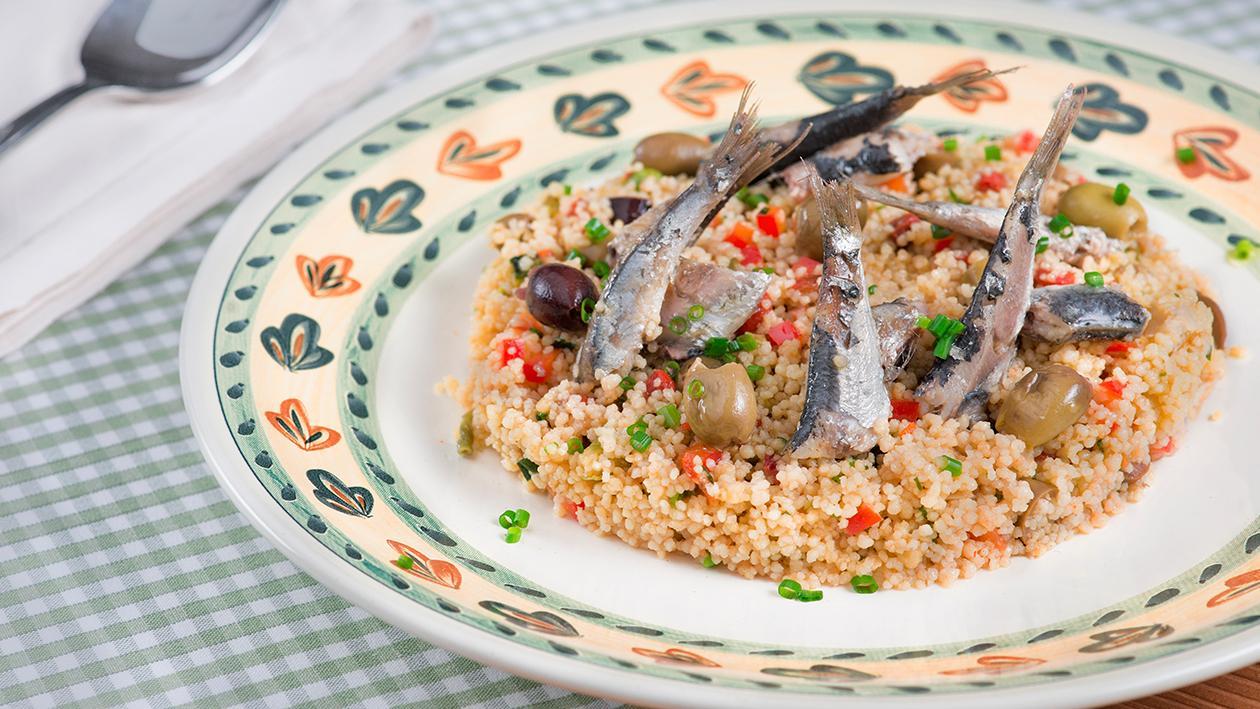 Cous Cous con olive leccine, alici confit ed erba cipollina – Ricetta Cous Cous con olive leccine, alici confit ed erba cipollina – Ricetta