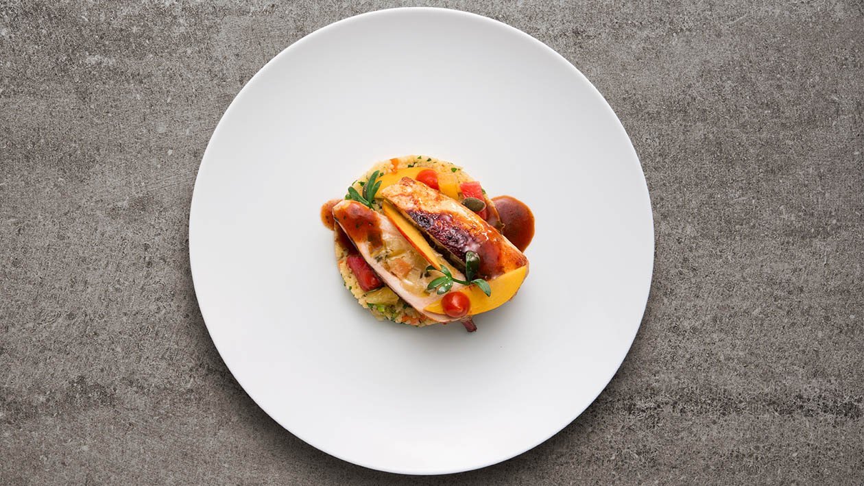 Galletto alla diavola farcito con albicocche su tortino di cous cous agli agrumi – Ricetta Galletto alla diavola farcito con albicocche su tortino di cous cous agli agrumi – Ricetta