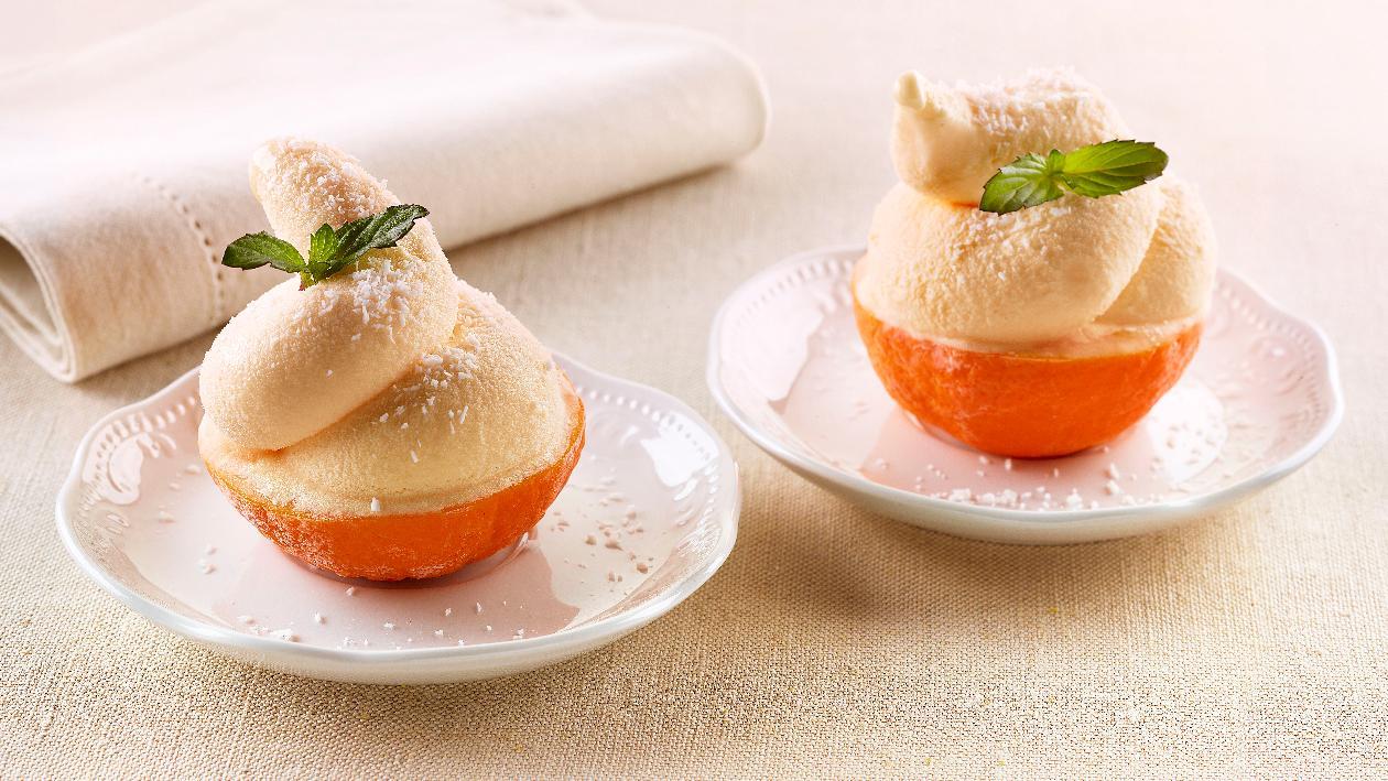 Mandarini ripieni di sorbetto al mandarino, batida de coco e cocco rapè – Ricetta Mandarini ripieni di sorbetto al mandarino, batida de coco e cocco rapè – Ricetta