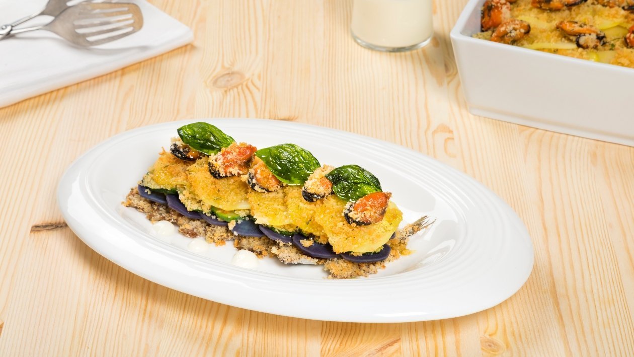 Millefoglie gratin di alici, cozze, zucchine e patate viola – Ricetta Millefoglie gratin di alici, cozze, zucchine e patate viola – Ricetta