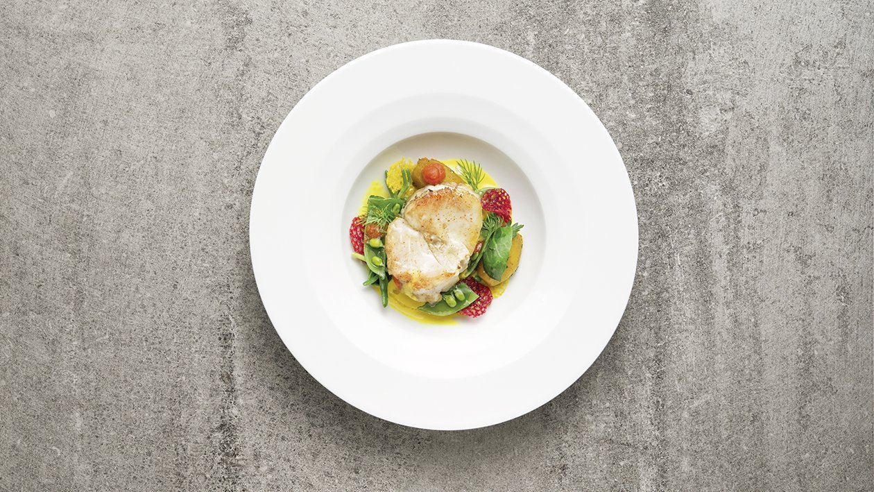 “Ossobuco” di pescatrice arrostito con verdurine novelle e salsa allo zafferano – Ricetta “Ossobuco” di pescatrice arrostito con verdurine novelle e salsa allo zafferano – Ricetta