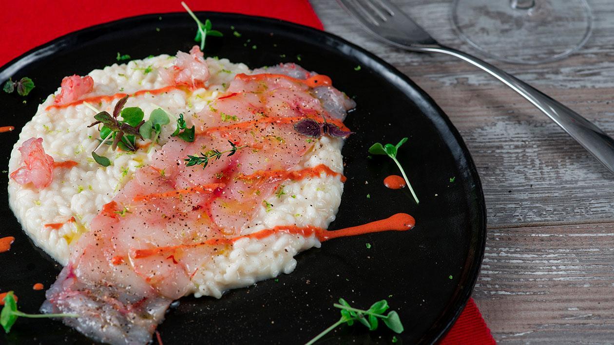 Risotto al lime con carpaccio di gamberi rossi ed emulsione delle loro