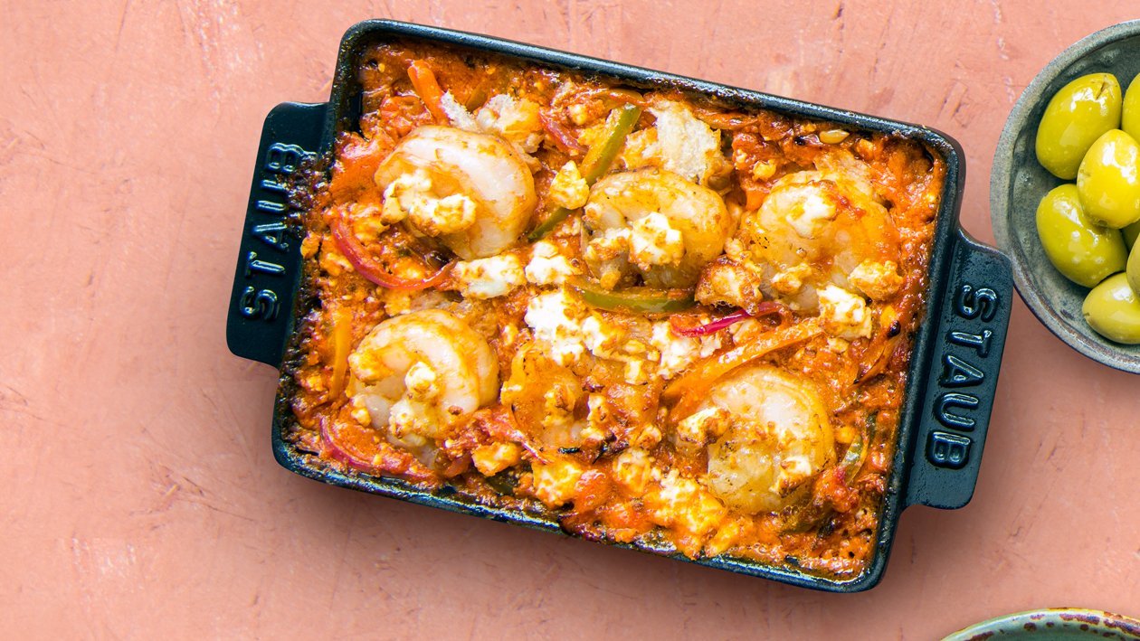 Scampi saganaki in een kruidig tomatensausje Scampi saganaki in een kruidig tomatensausje