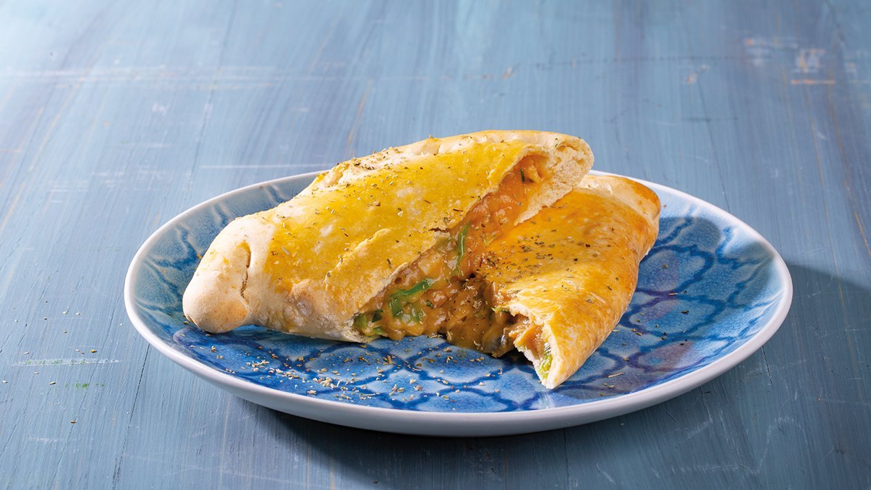 Empanada de amêijoa com alho francês e cebolo